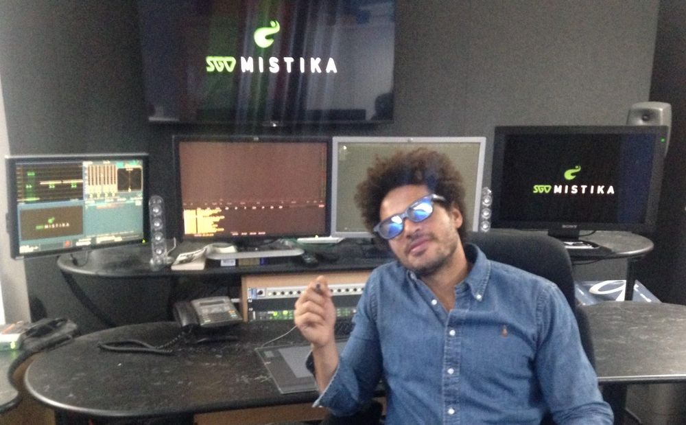 Mo in the Mistika finishing suite, in front of grading monitors and control panels.