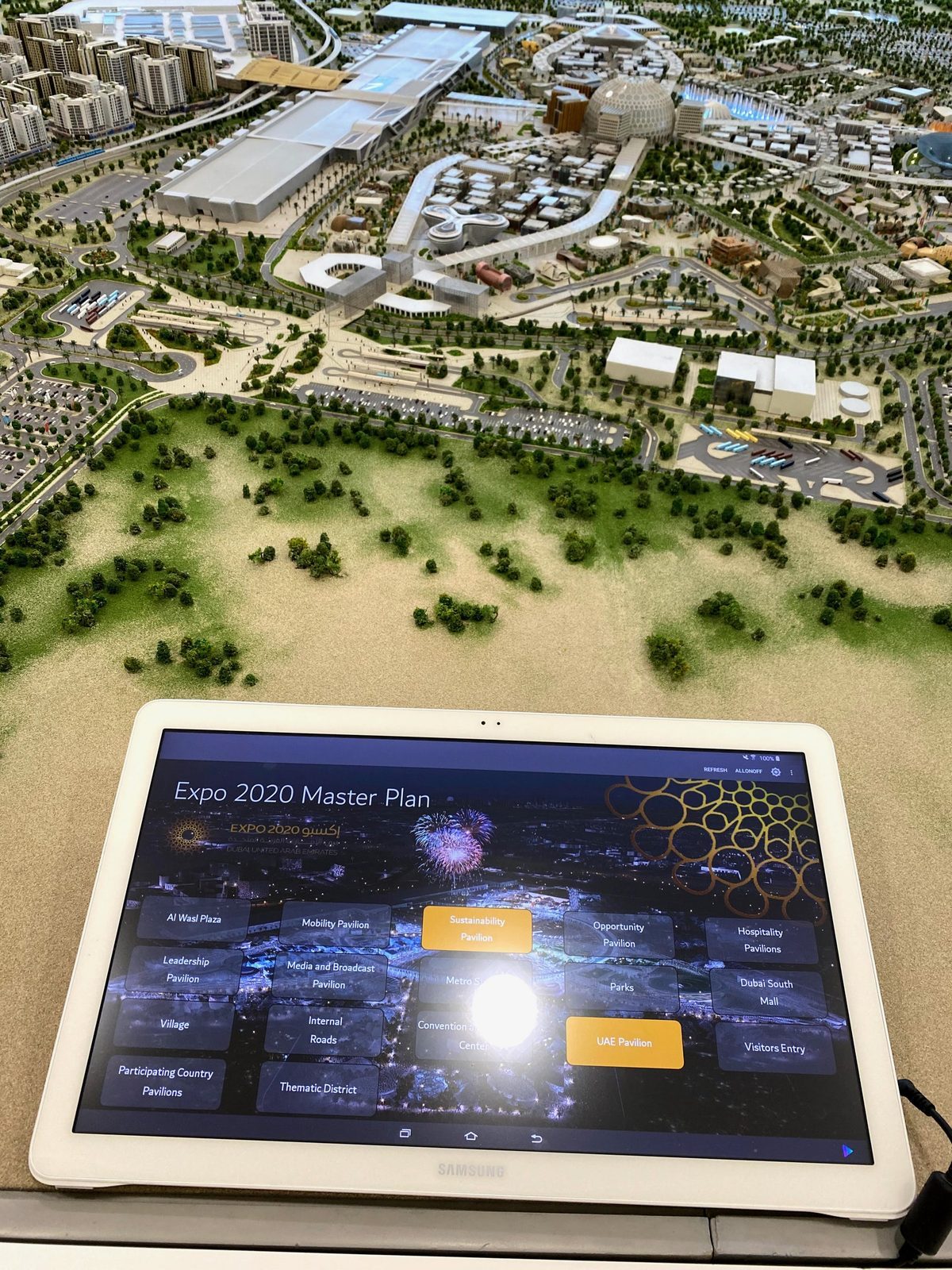 The Expo 2020 master plan model next to the interactive plan on a tablet, before the gates opened